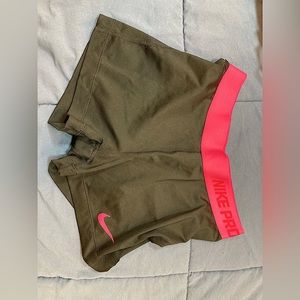 Black and pink Nike Pro spandex